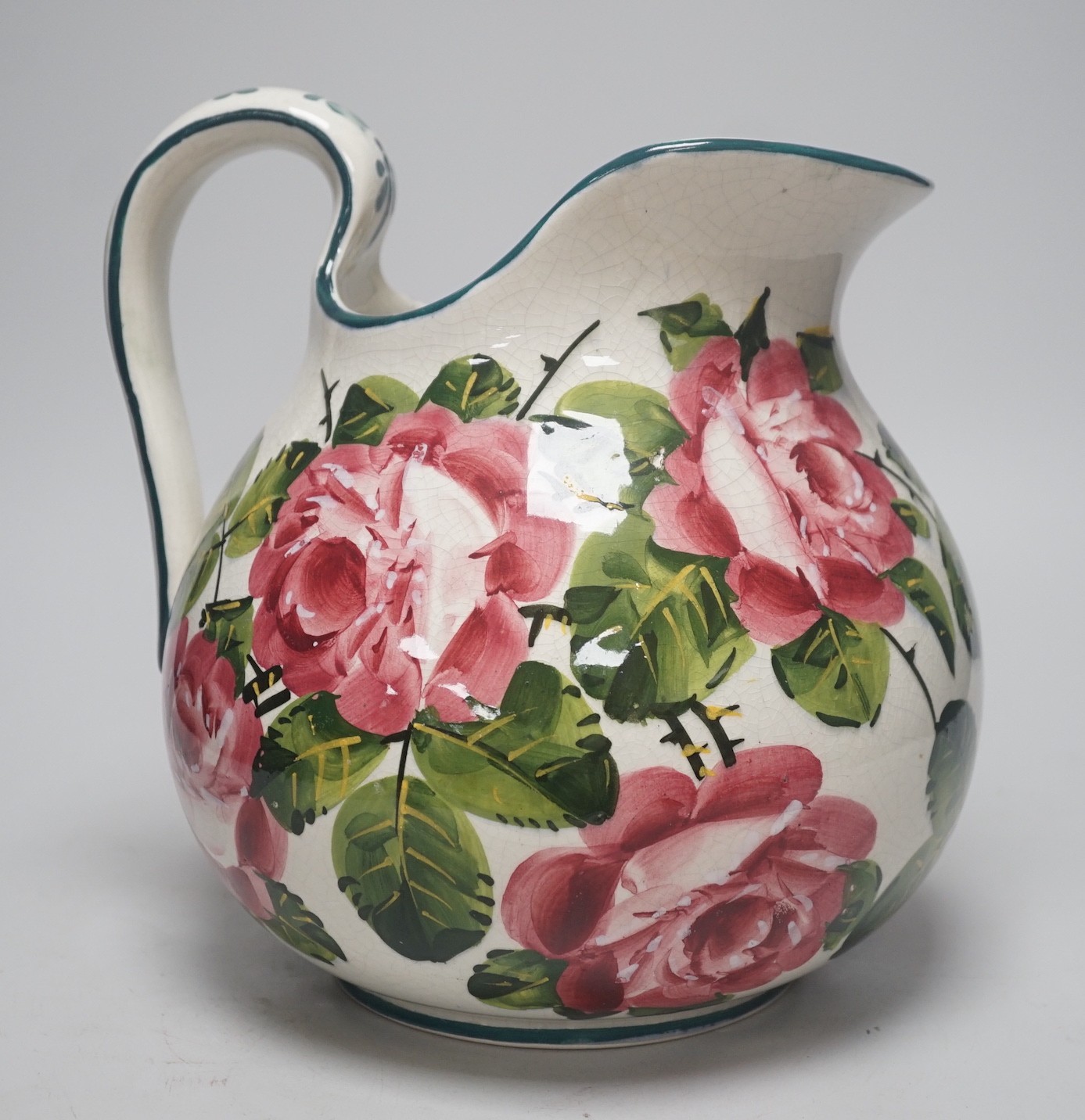 A Wemyss ewer, ‘cabbage roses’ patterns, painted Wemyss mark to base. 26cm tall